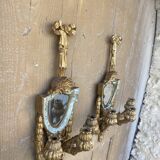 Pair of carved wood sconces