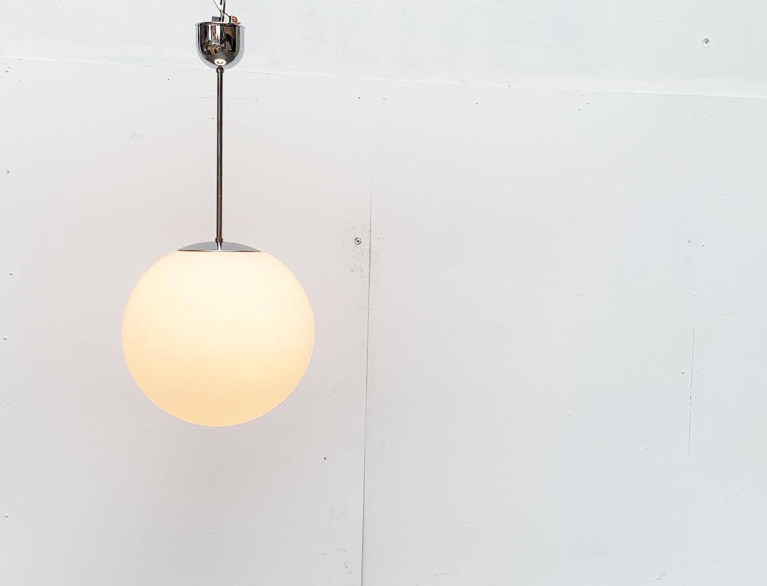 Vintage German space age glass ball pendant lamp by Limburg.