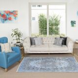 Mid-20th century hand-knotted turkish rug over-dyed in light blue. tek0394