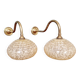 Pair of brass and yellow/white speckled glass wall sconces