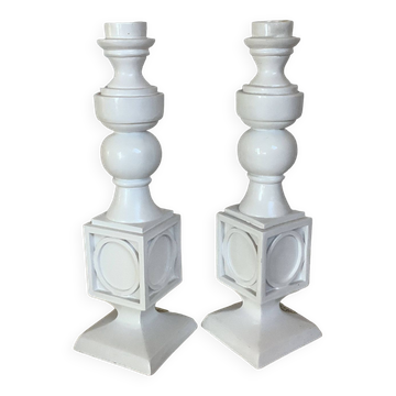 Pair of white resin candle holders