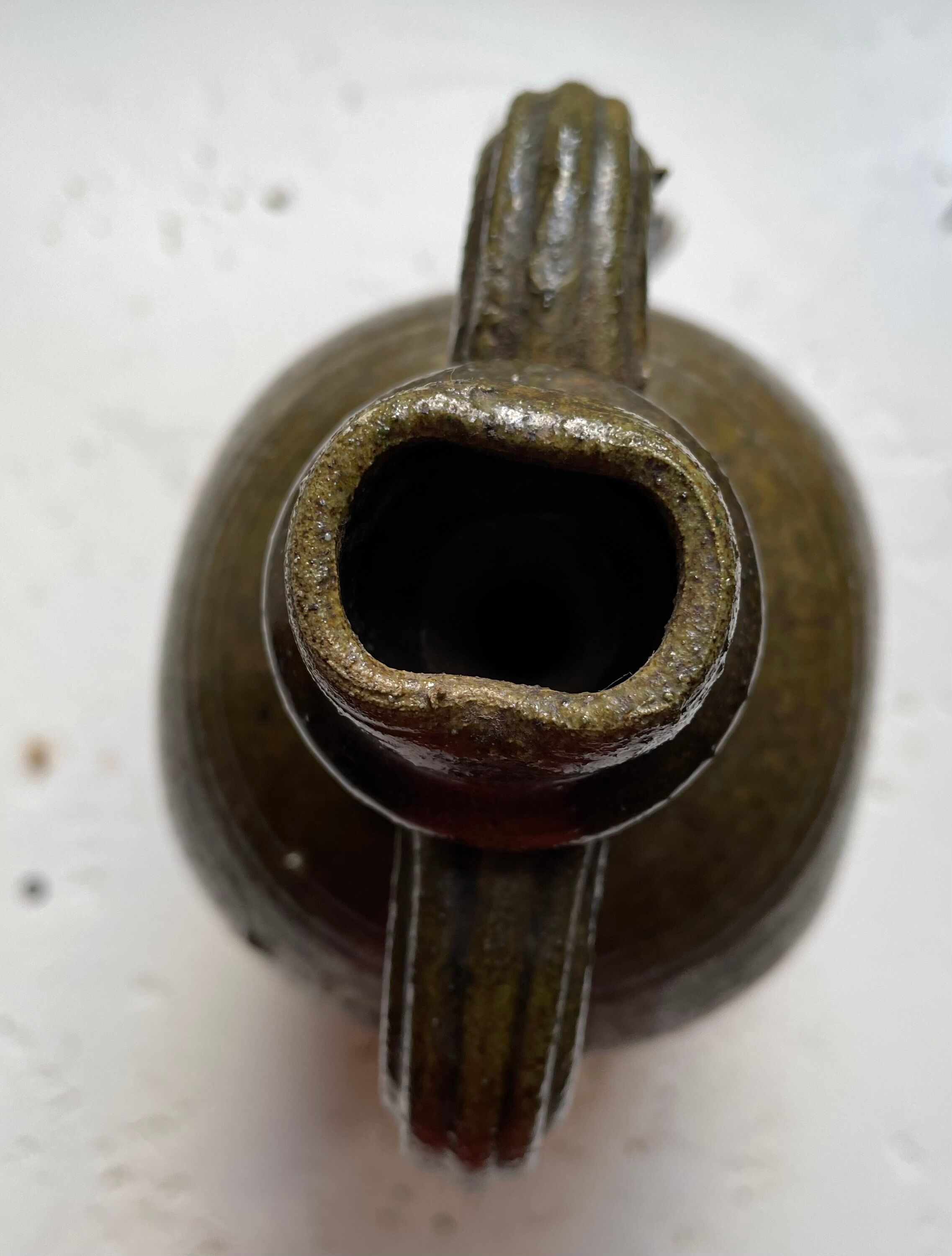 Persimmon glazed terracotta oil jar