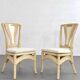 1970s rattan table with stone marquetry and matching chairs.