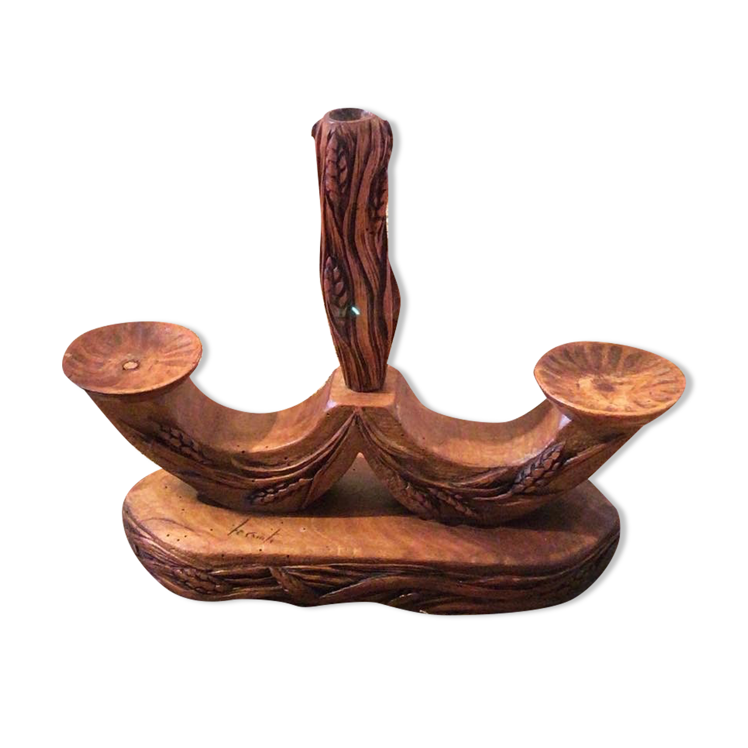 Carved wooden candle holder