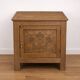 Oak side cabinet with carved motifs