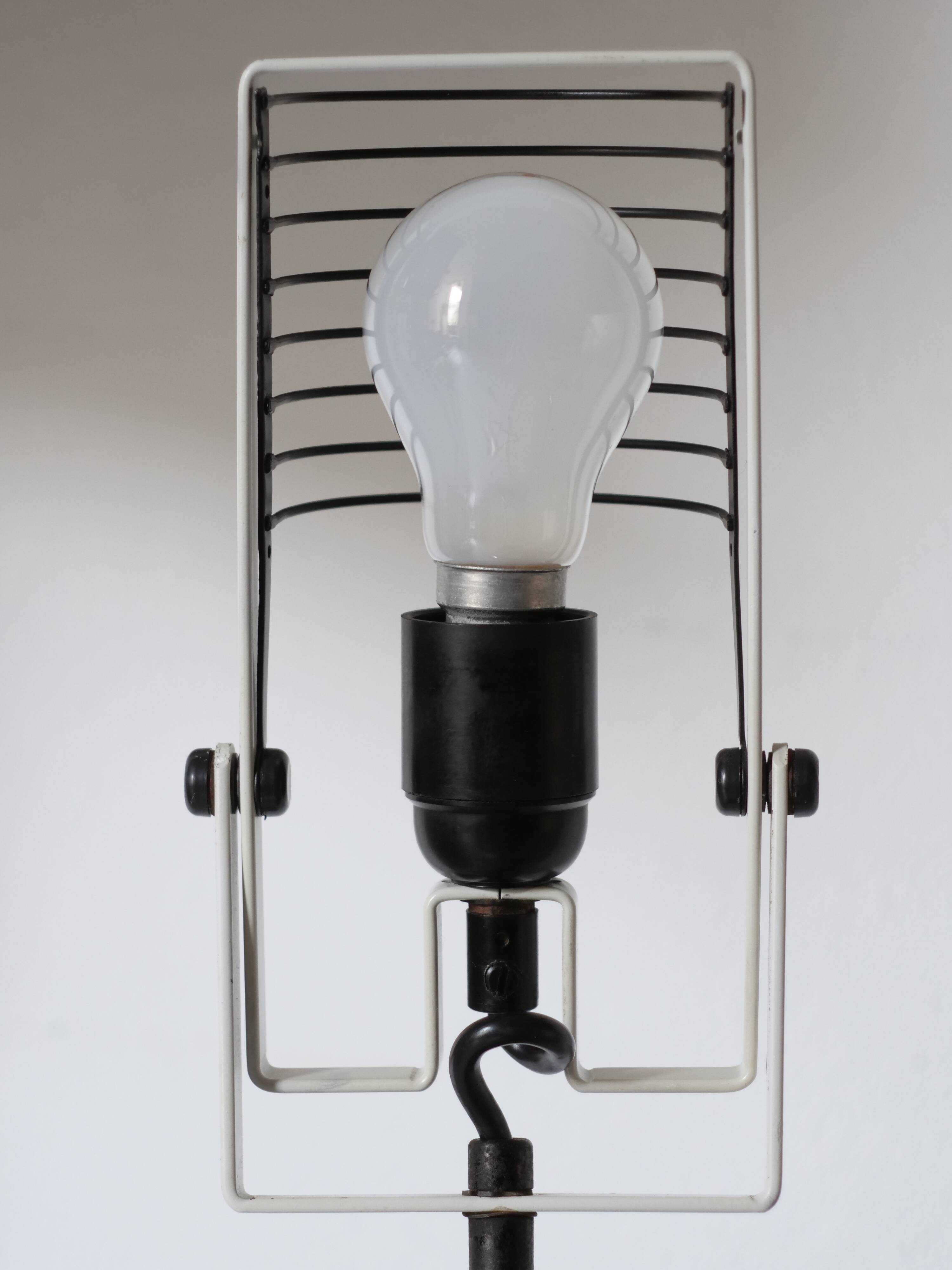 Artemide clamp lamp designed by Ernesto Gismondi model Sintesi