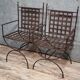 Paire de fauteuils curules en fer tréssé et laiton doré (B)