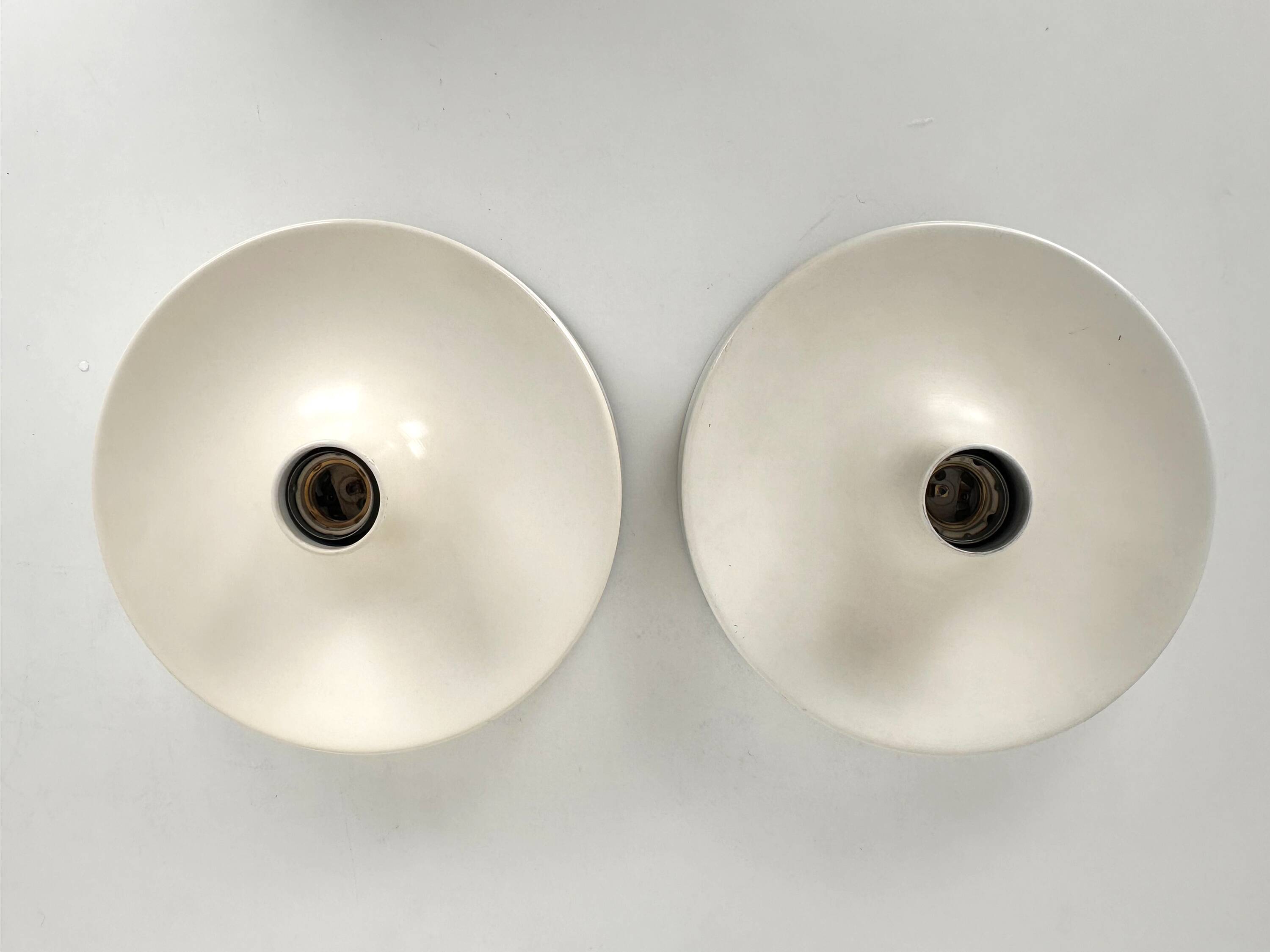 Pair of wall lights selected by Charlotte Perriand, Germany 1960