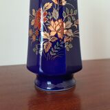 Vase bleu fleurs oranges et vertes