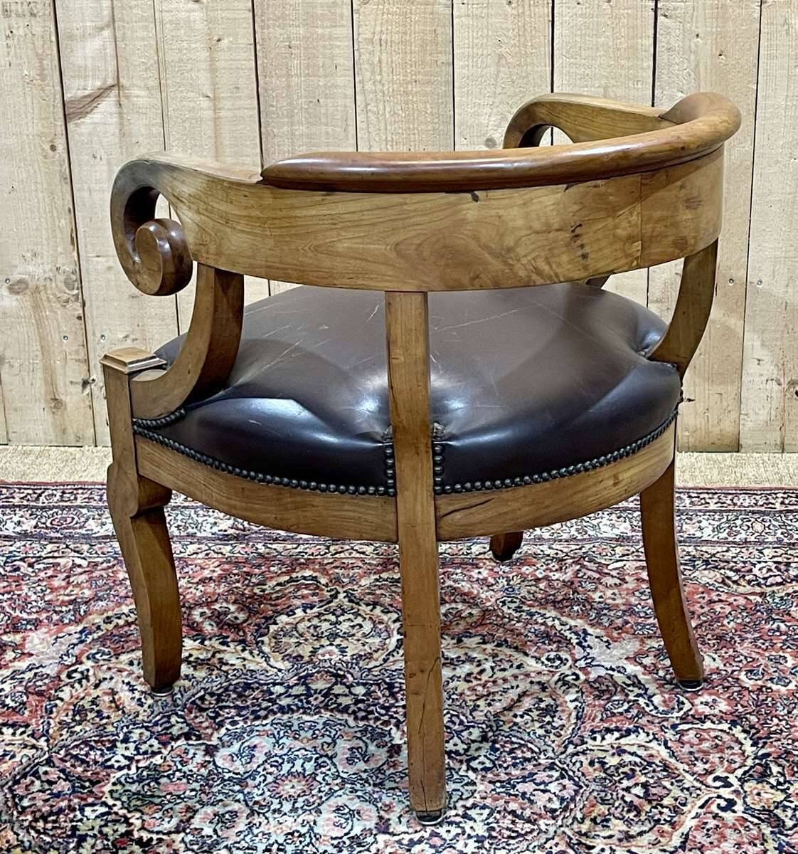 19th century French armchair in cherry wood and leather seat
