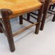 Set of 4 vintage brutalist chairs by Georges Robert in wood and straw.