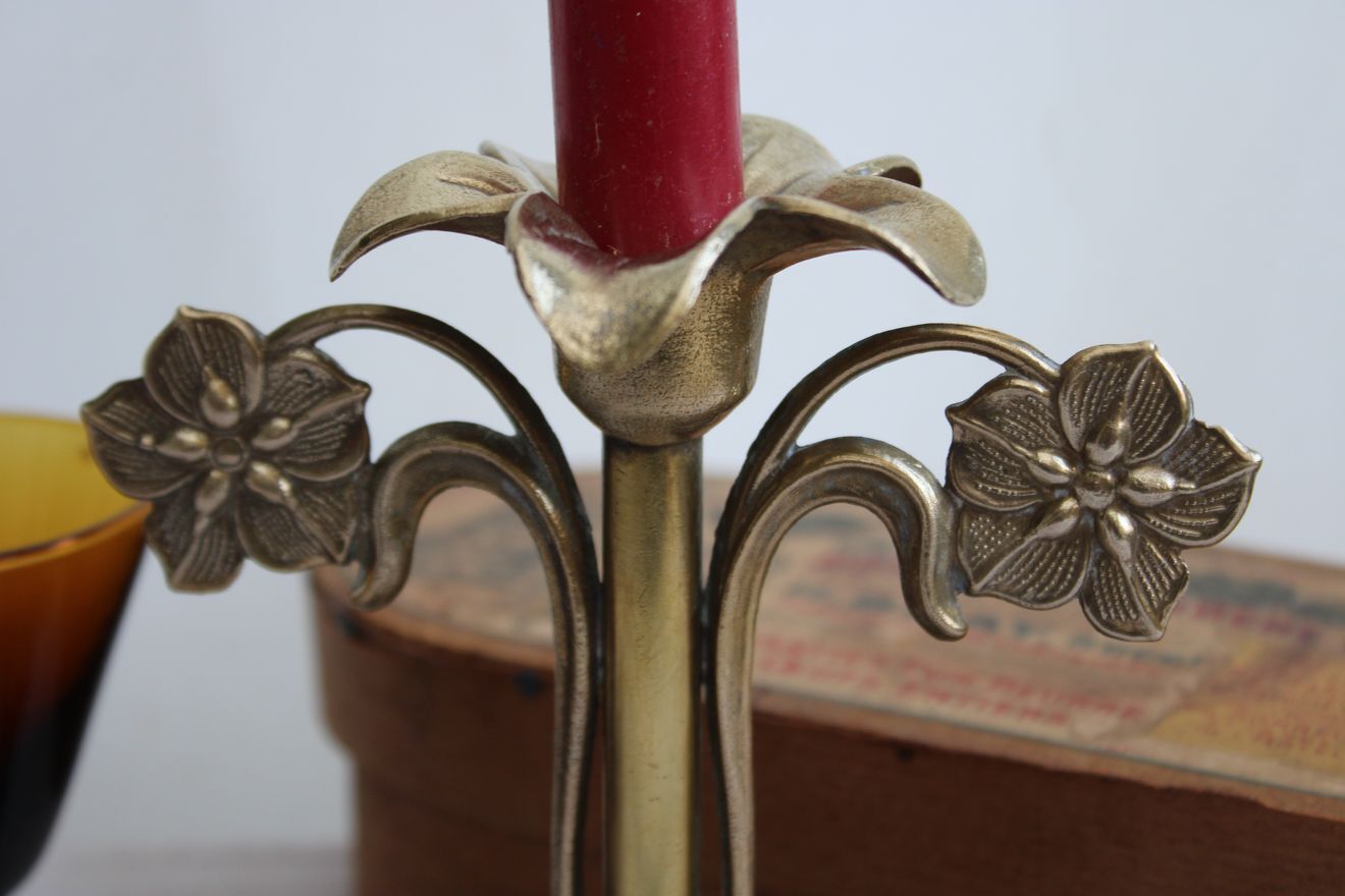 Golden metal stand candle holder