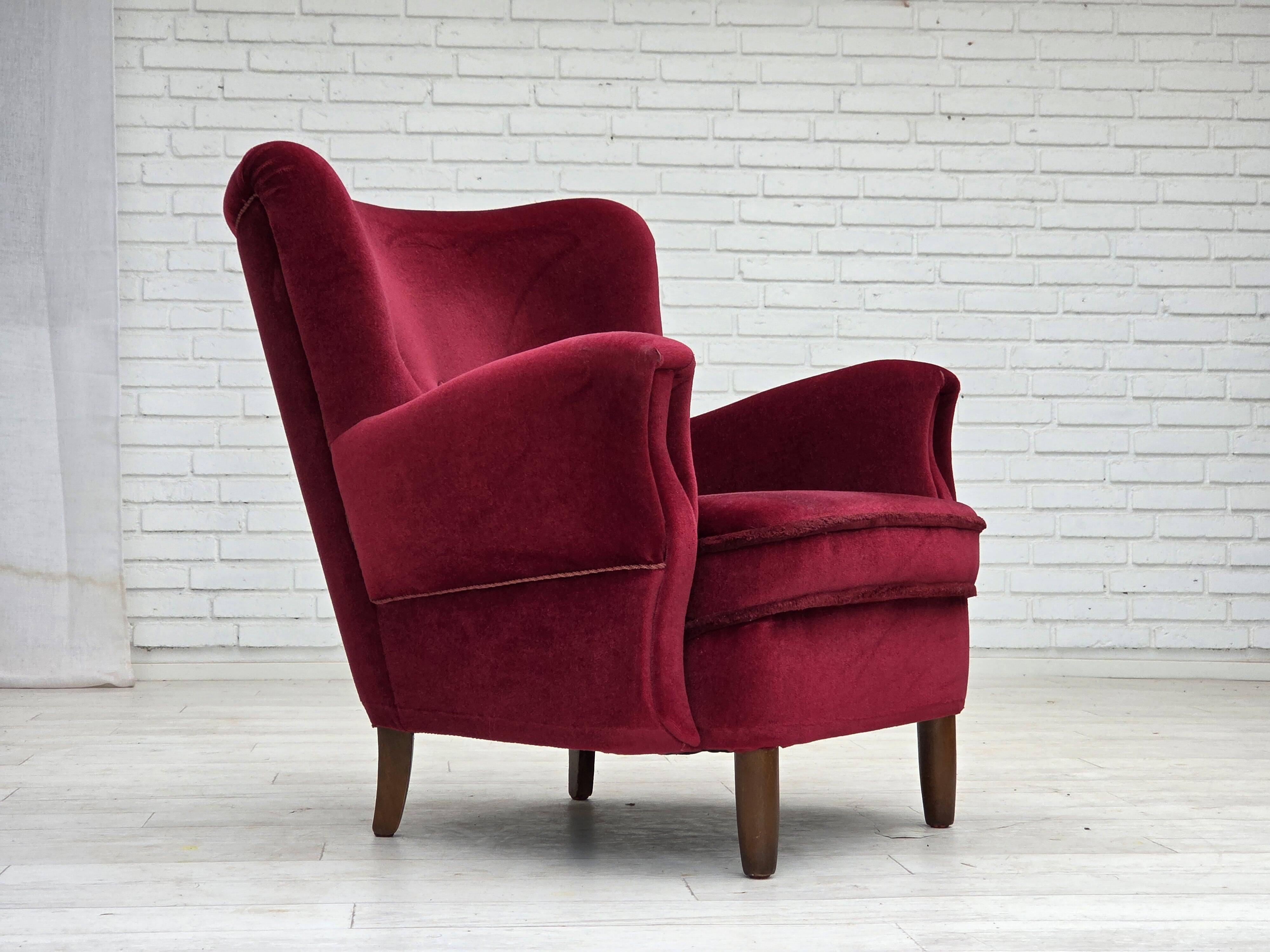 1960s, Danish armchair, cherry-red furniture velour, beech wood legs.