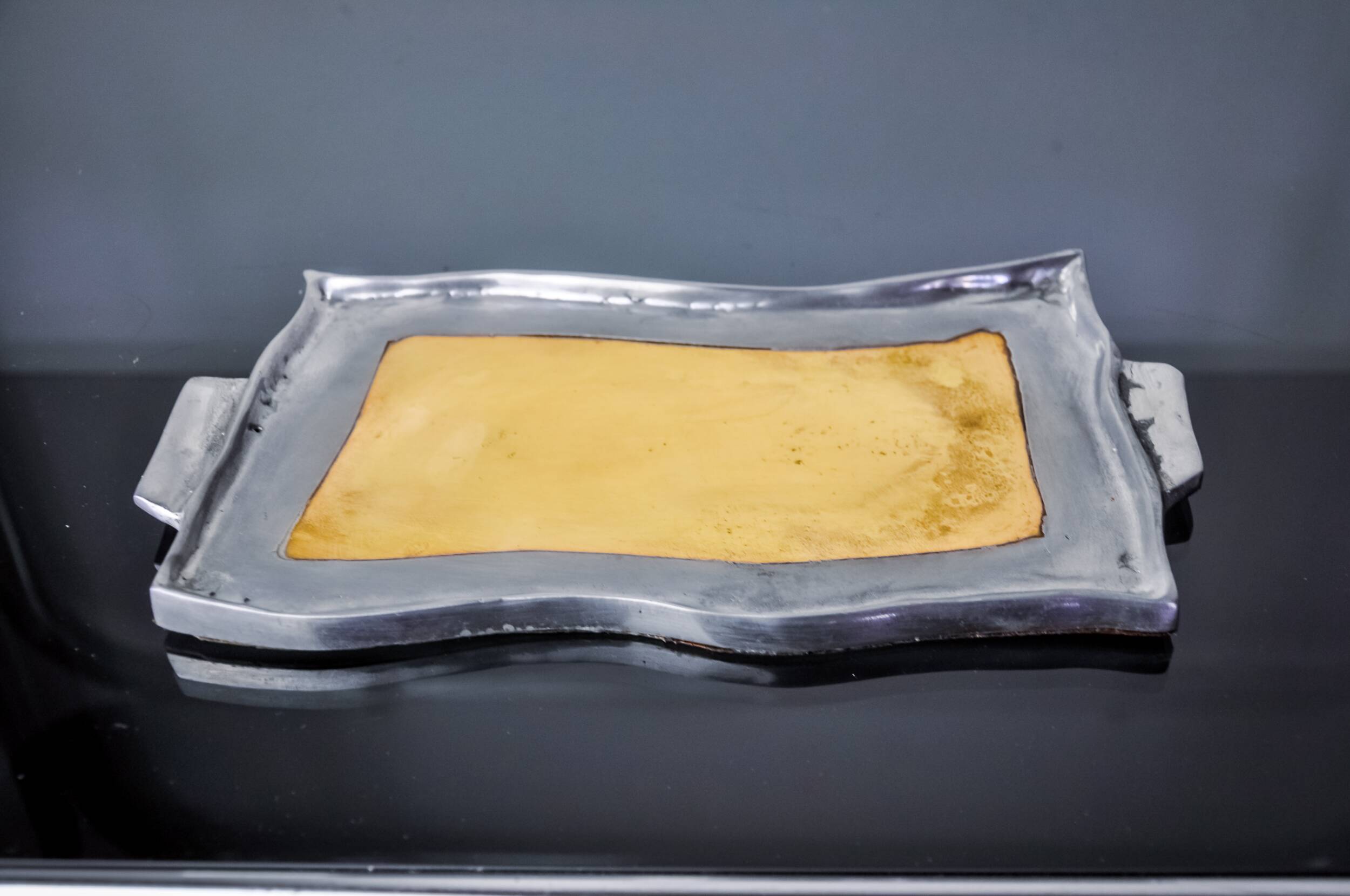 Brutalist pocket emptier by Leopold, bronze and aluminum 1970, Spain