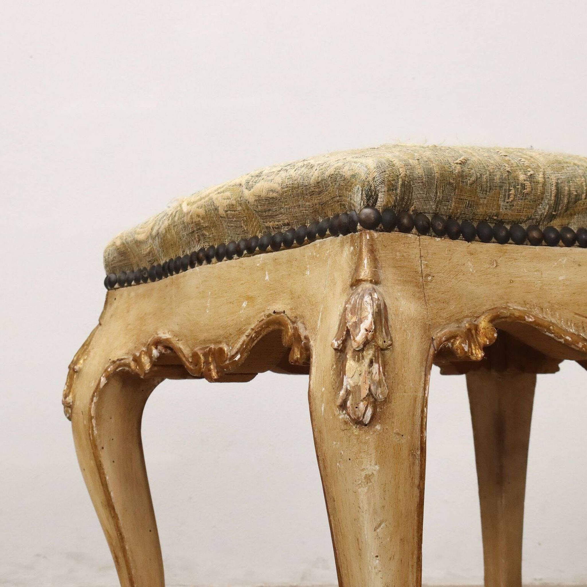 Pair of antique baroque-style poufs in gilded wood, 19th century.