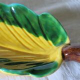Empty pocket in the shape of a leaf in very good condition