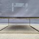 Table basse en marbre noir et laiton