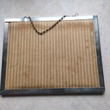 Barber mirror with chain.