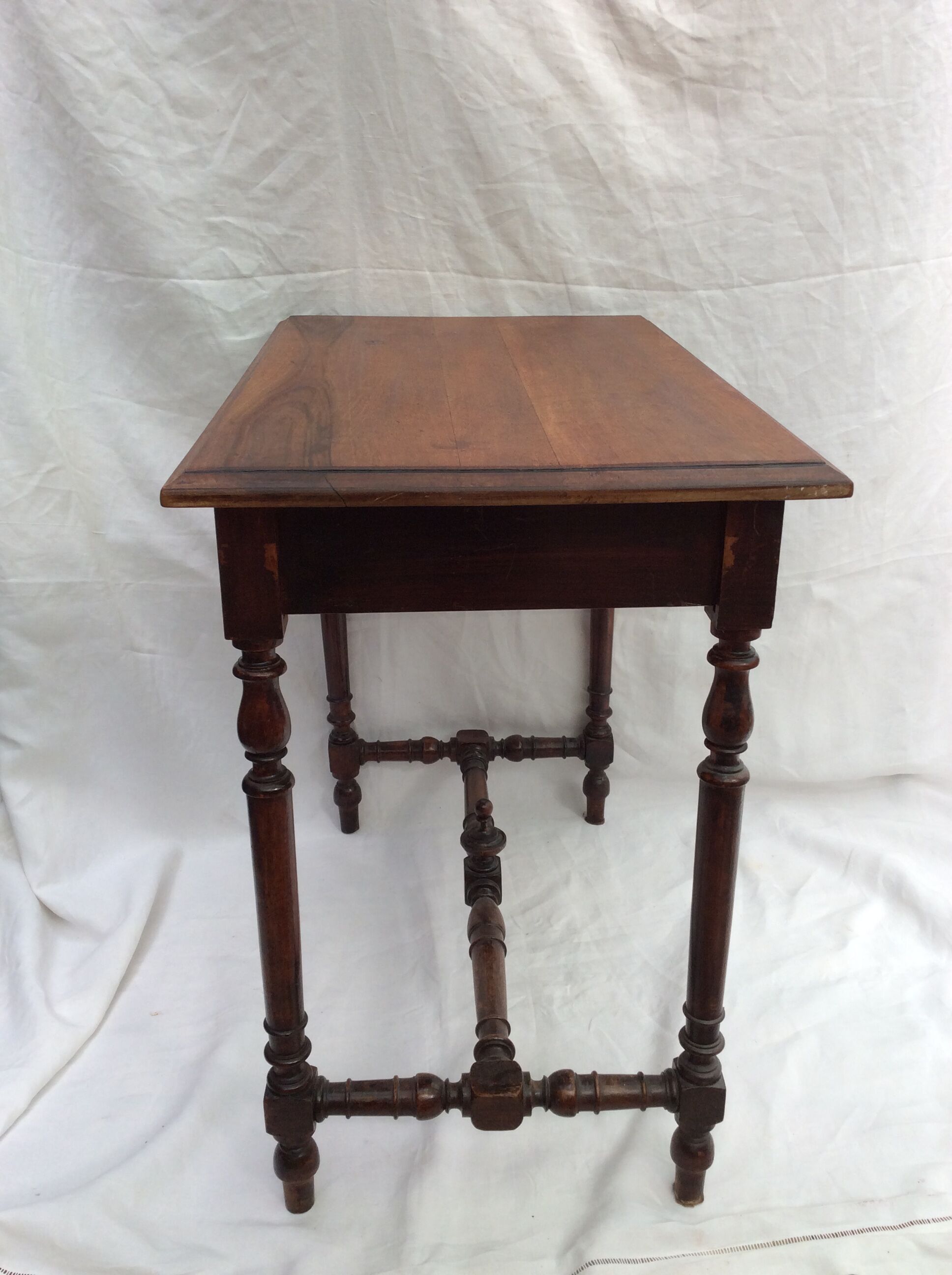 Old wooden table with drawer