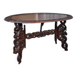 Asian table, mid-height, made of exotic wood.