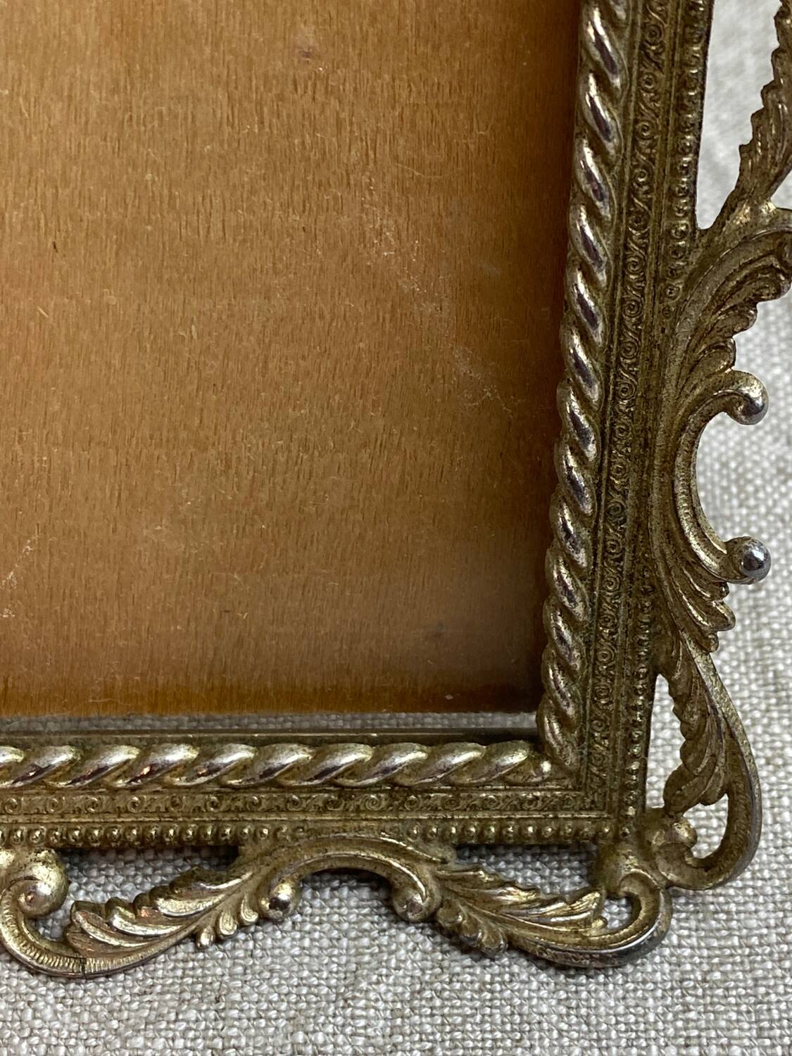 Italian gold metal frame on stand