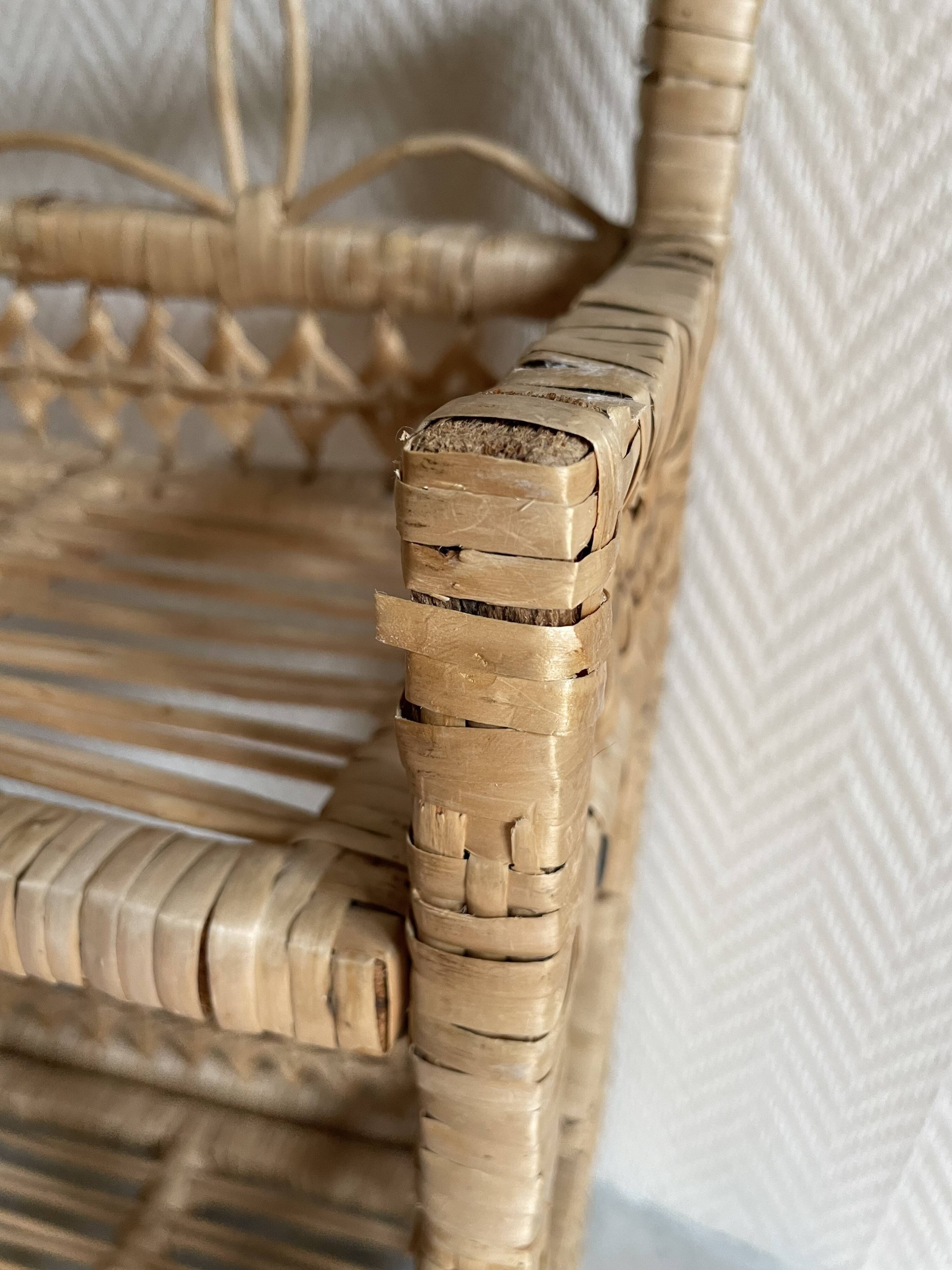 Small light beige wicker and rattan shelf