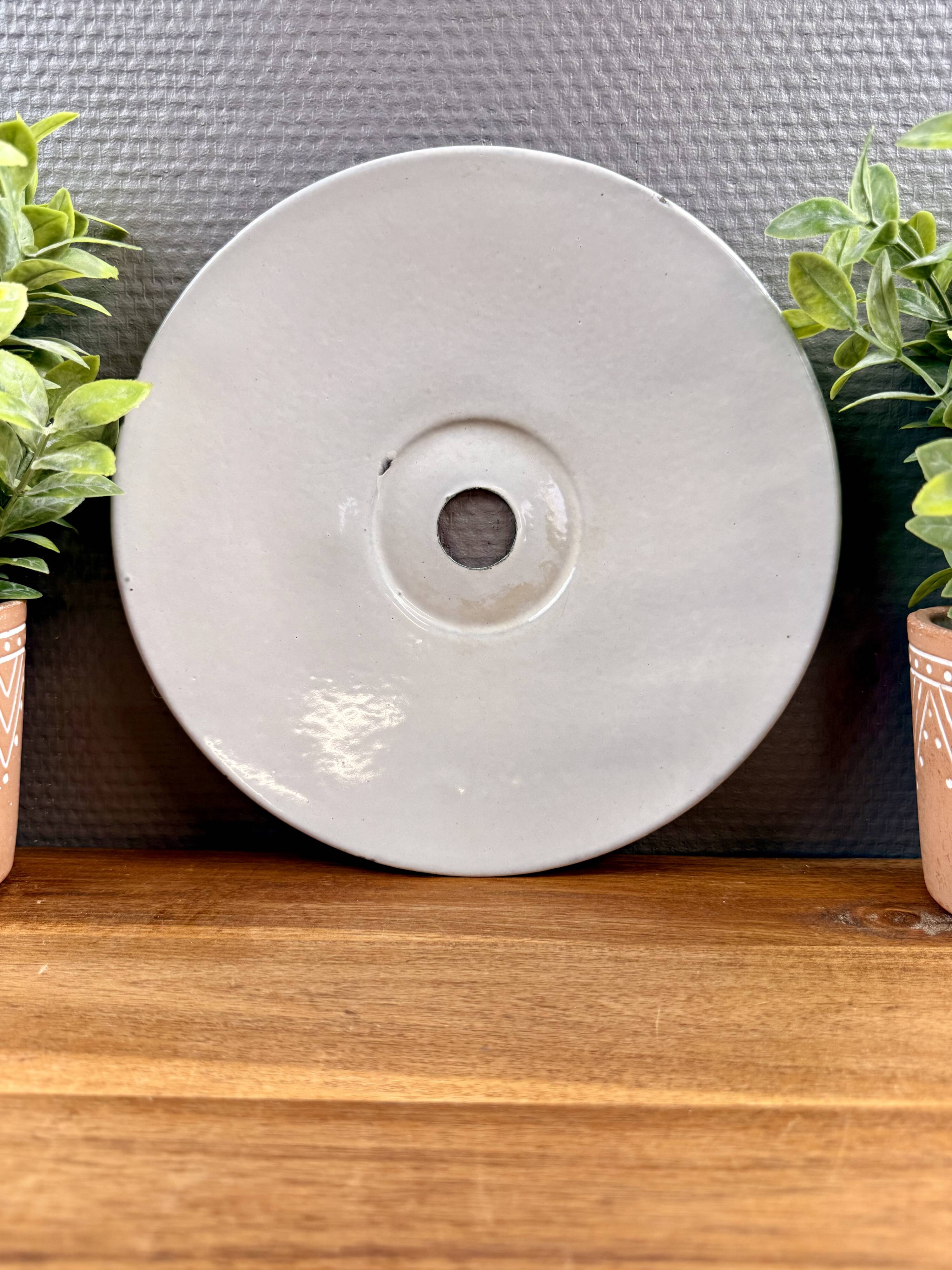 Old industrial workshop lampshade in green enamelled sheet metal.