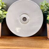 Old industrial workshop lampshade in green enamelled sheet metal.