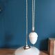 Suspension corole transparent serrated edge against weight