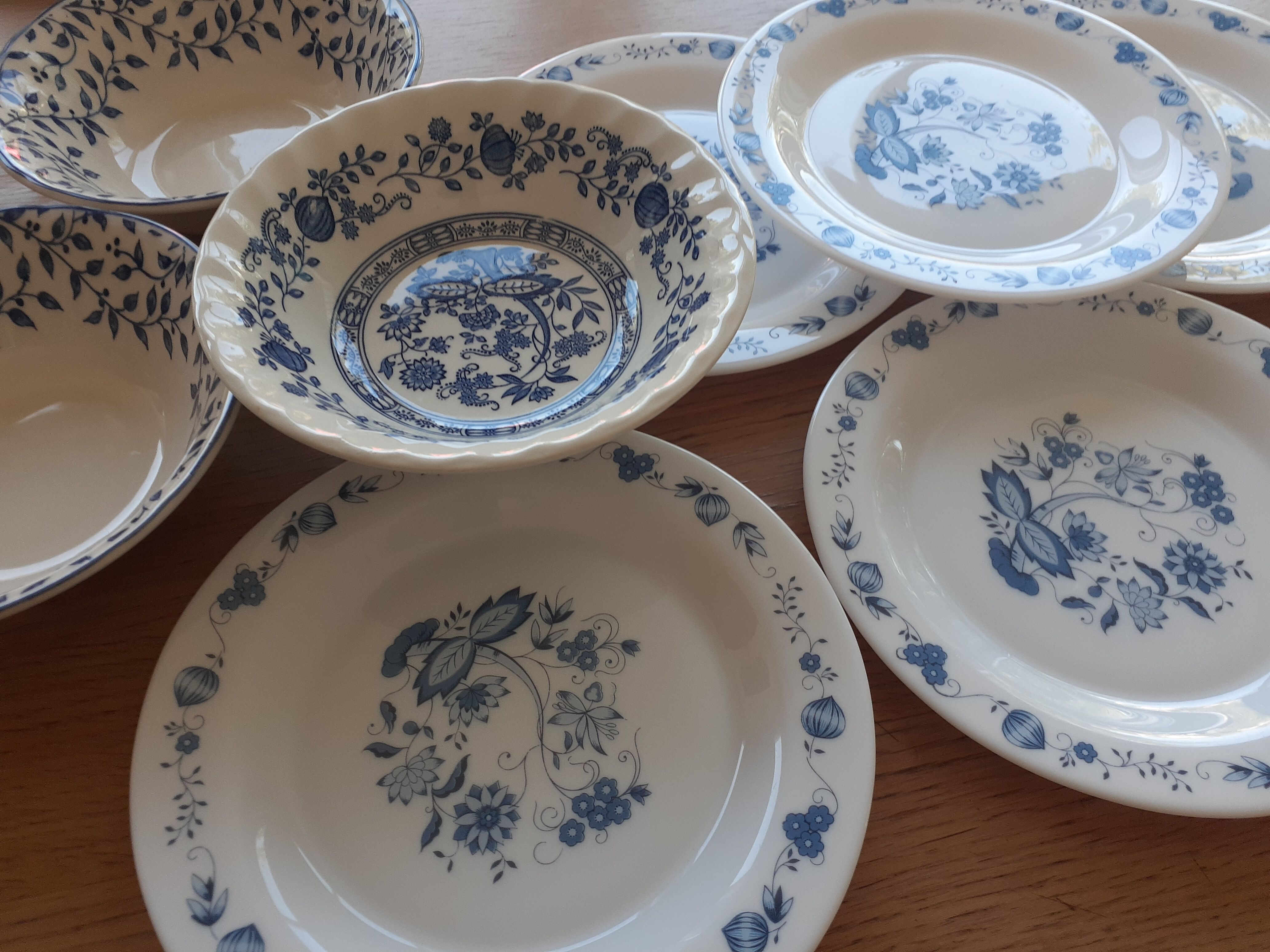 3 bowls and 5 blue plates