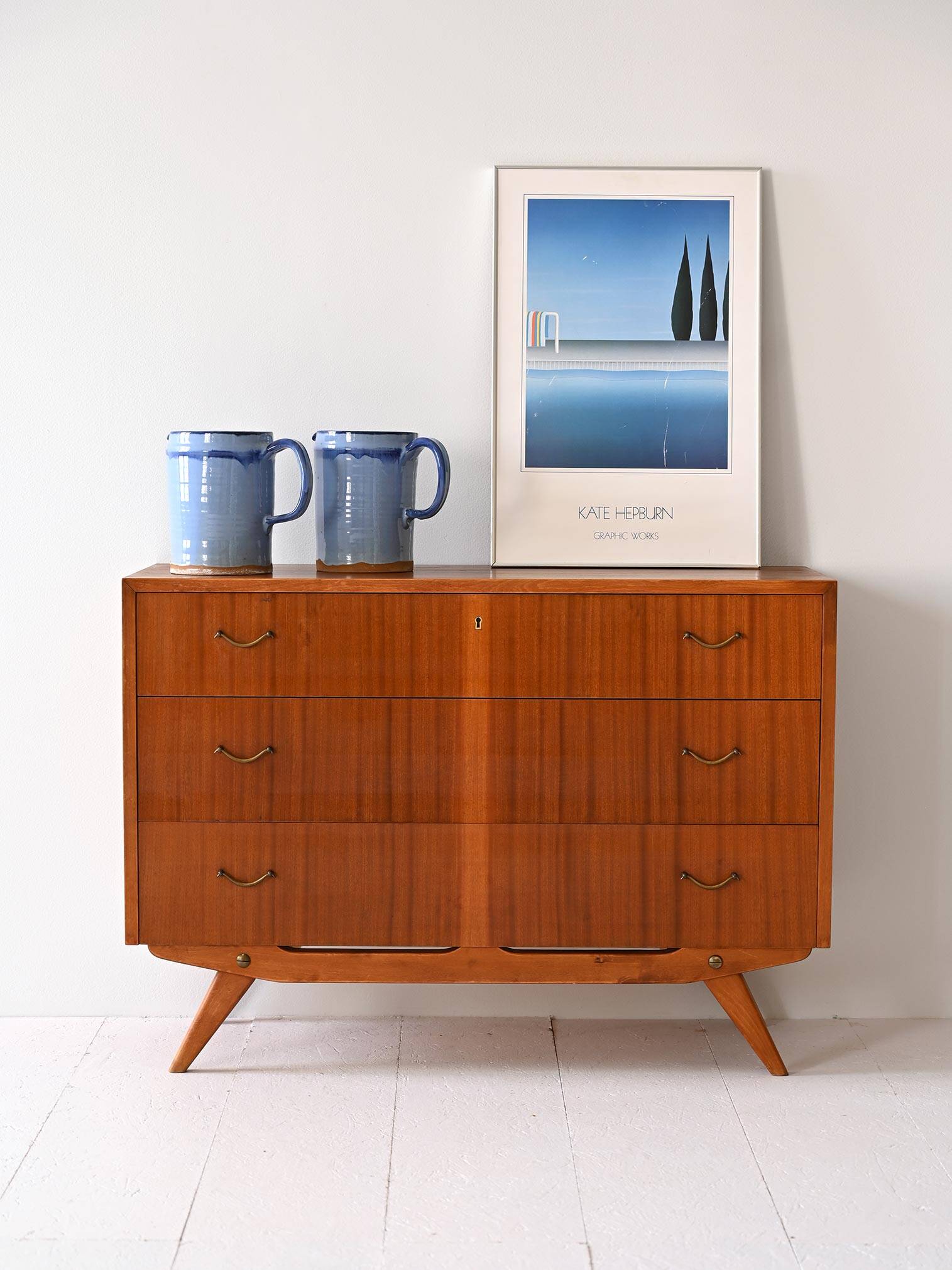 Scandinavian chest of drawers with metal handles