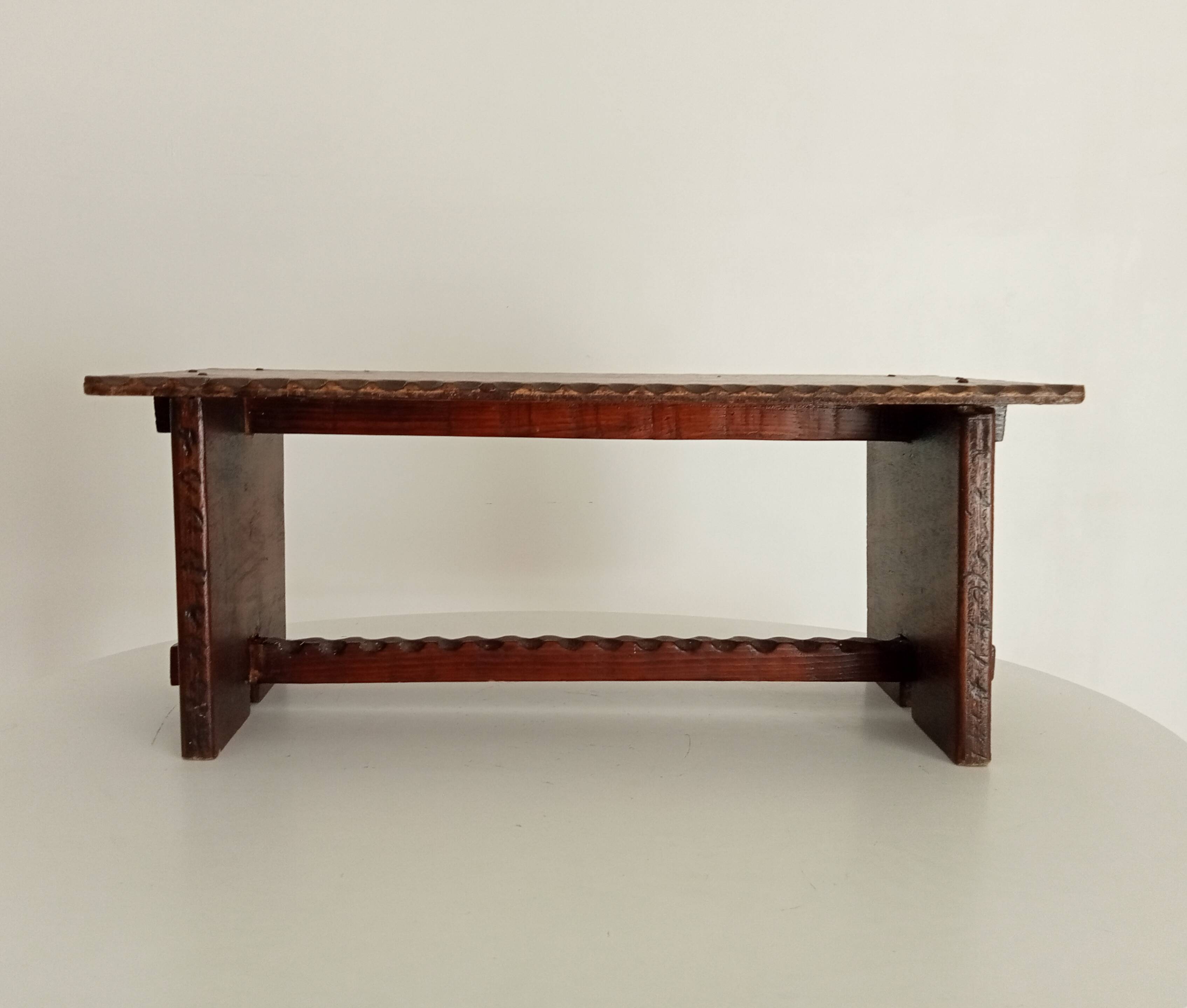 Low brutalist stool in the style of Charles Dudouyt.