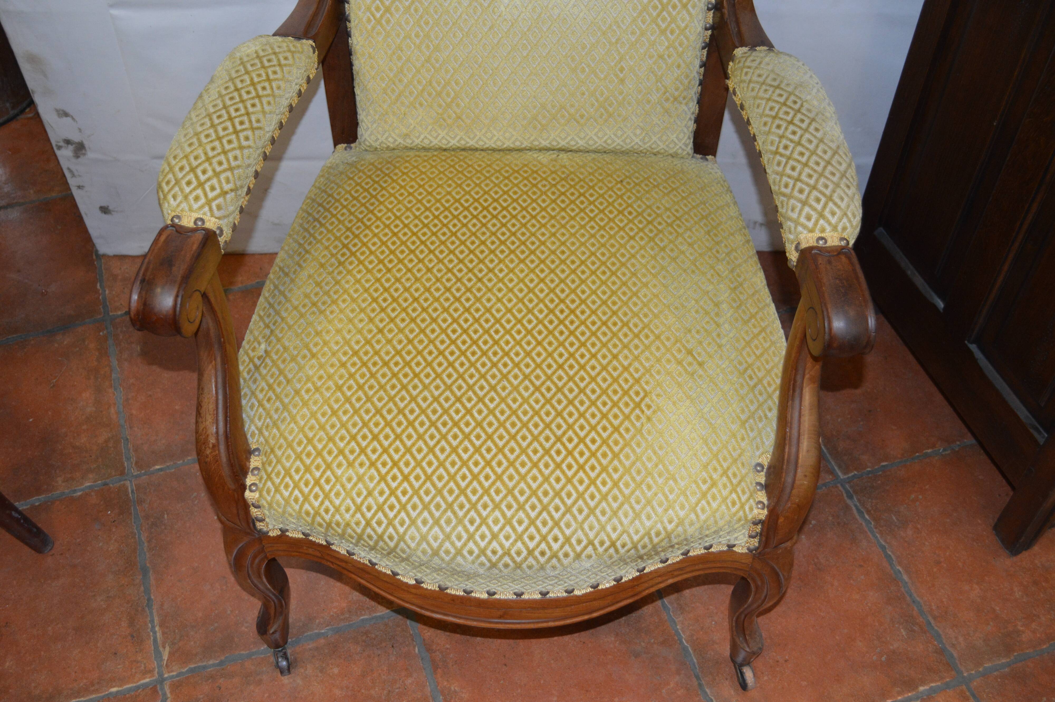 Walnut voltaire armchair