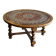 Vintage coffee table in turned wood and leather with astrological decoration.