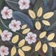 Painted canvas depicting a bird in a floral setting. Contemporary.