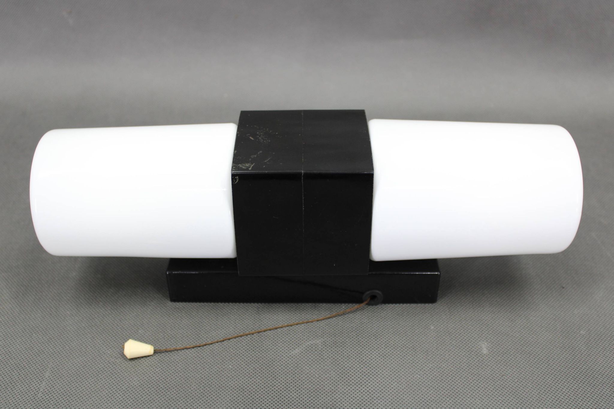Mid-century wall light in bakelite and glass, 1960s