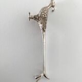 Six silver-plated knife rests in the shape of peacocks.