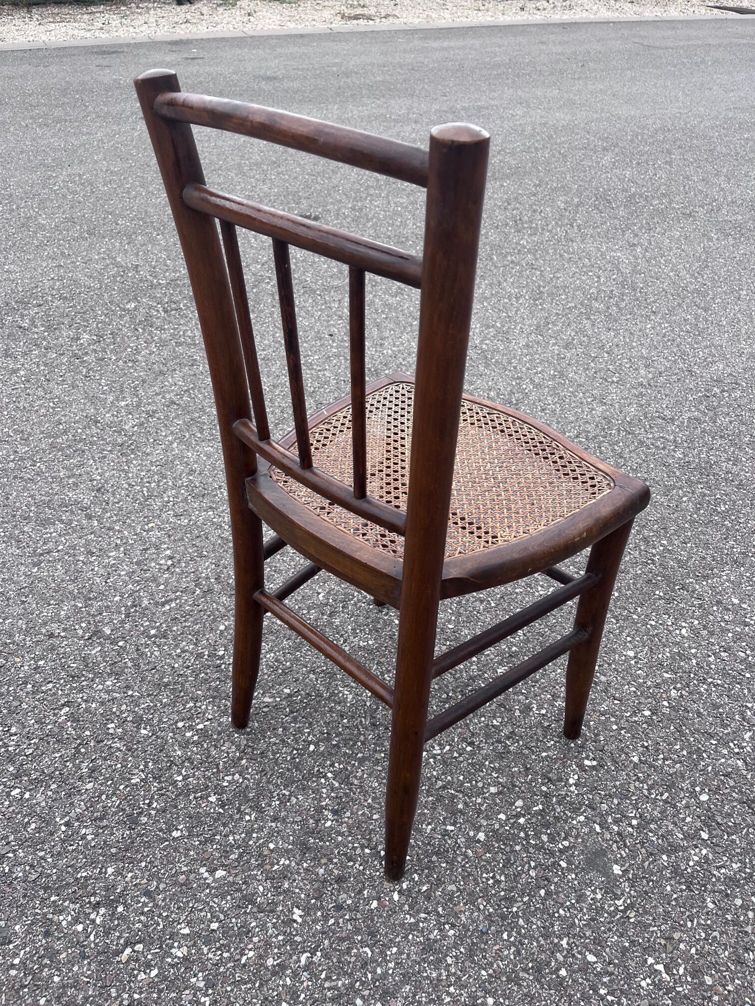 Pair of canned bistro chairs