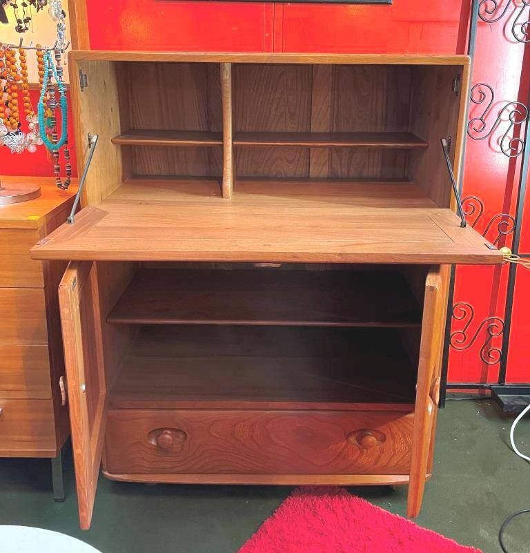 Ercol English wooden secretary, on wheels – 1970s.