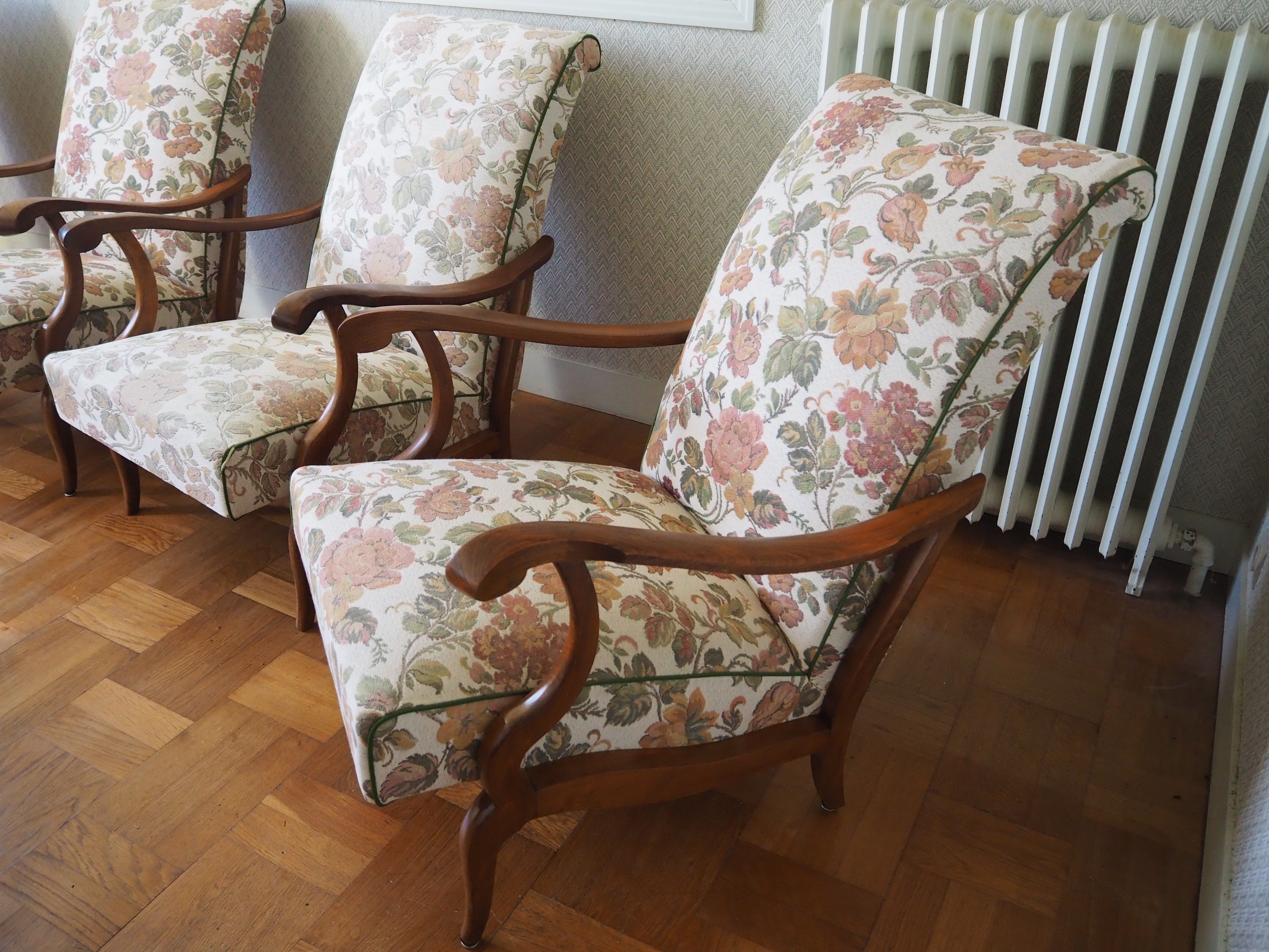 Four 1950s armchairs - wooden armrests