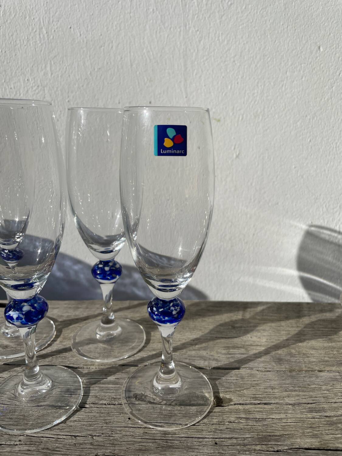 5 Luminarc blue glass flutes