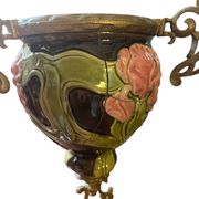 Art Nouveau suspension, rising and falling, in slipware, around 1900.