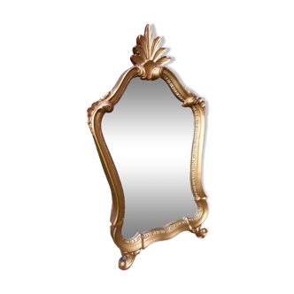 Old mirror in gilded wood