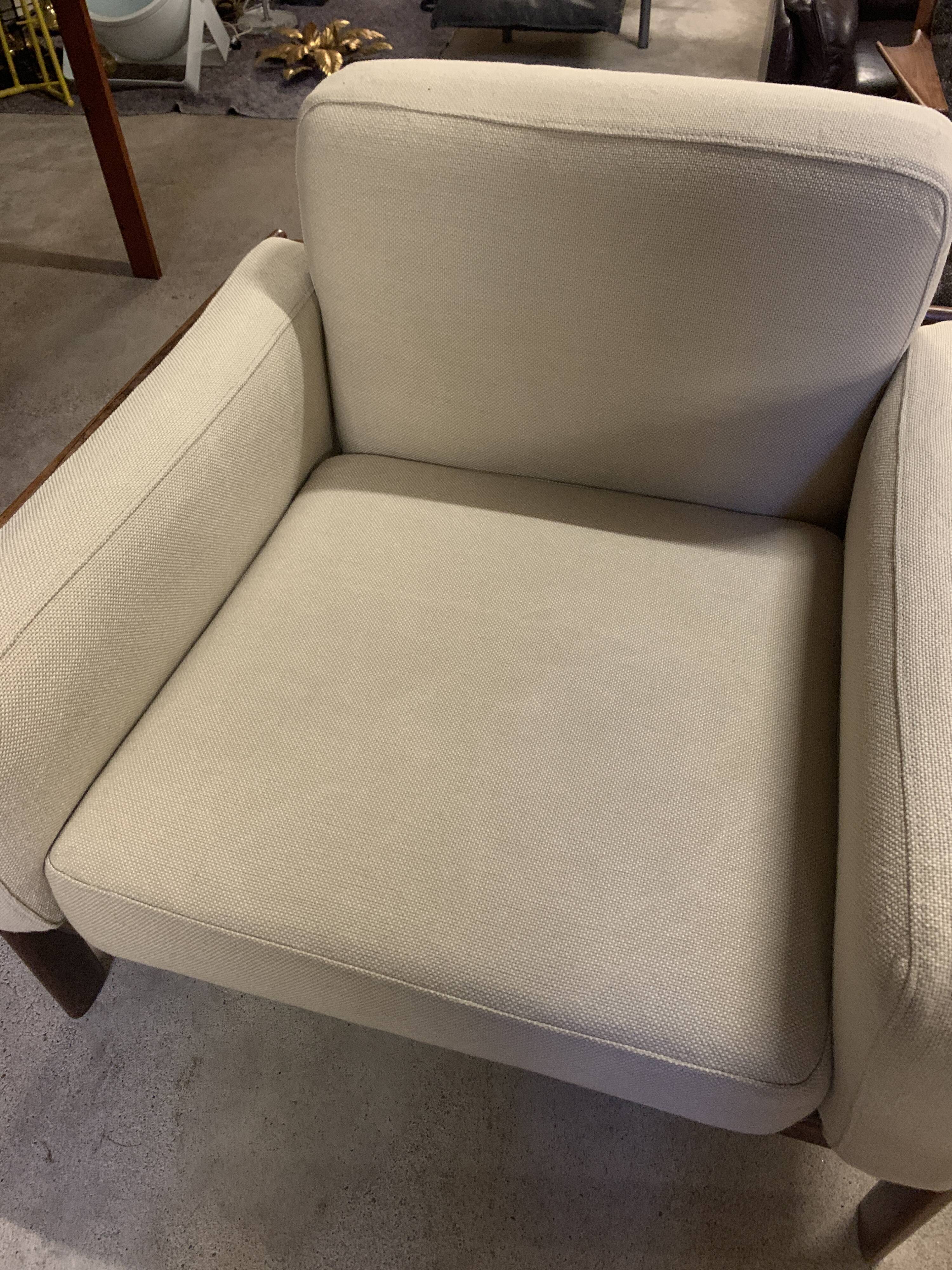 Two-seater and rosewood armchair produced by Komfort