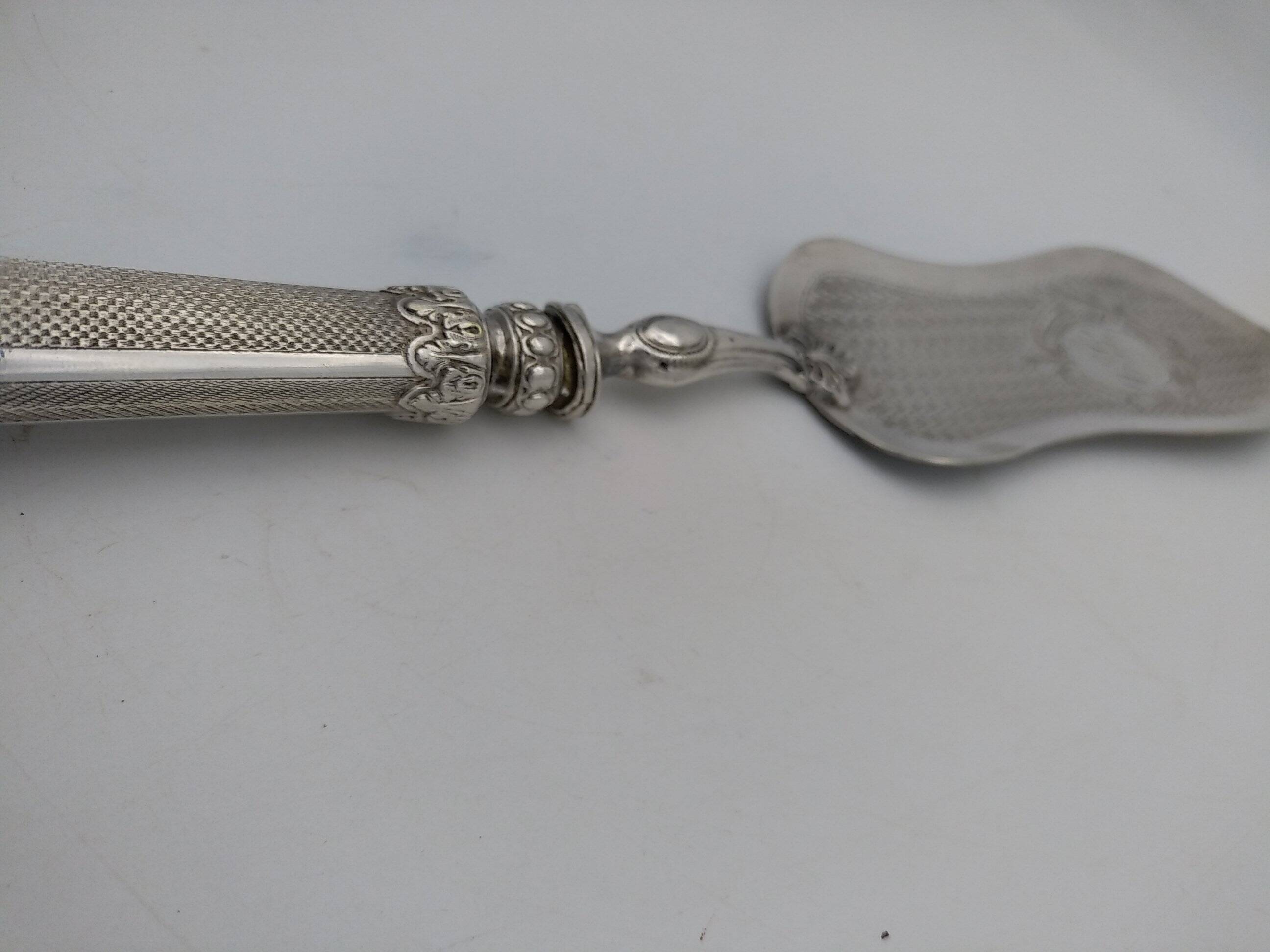 Silver and silver-filled pie server. 19th century.