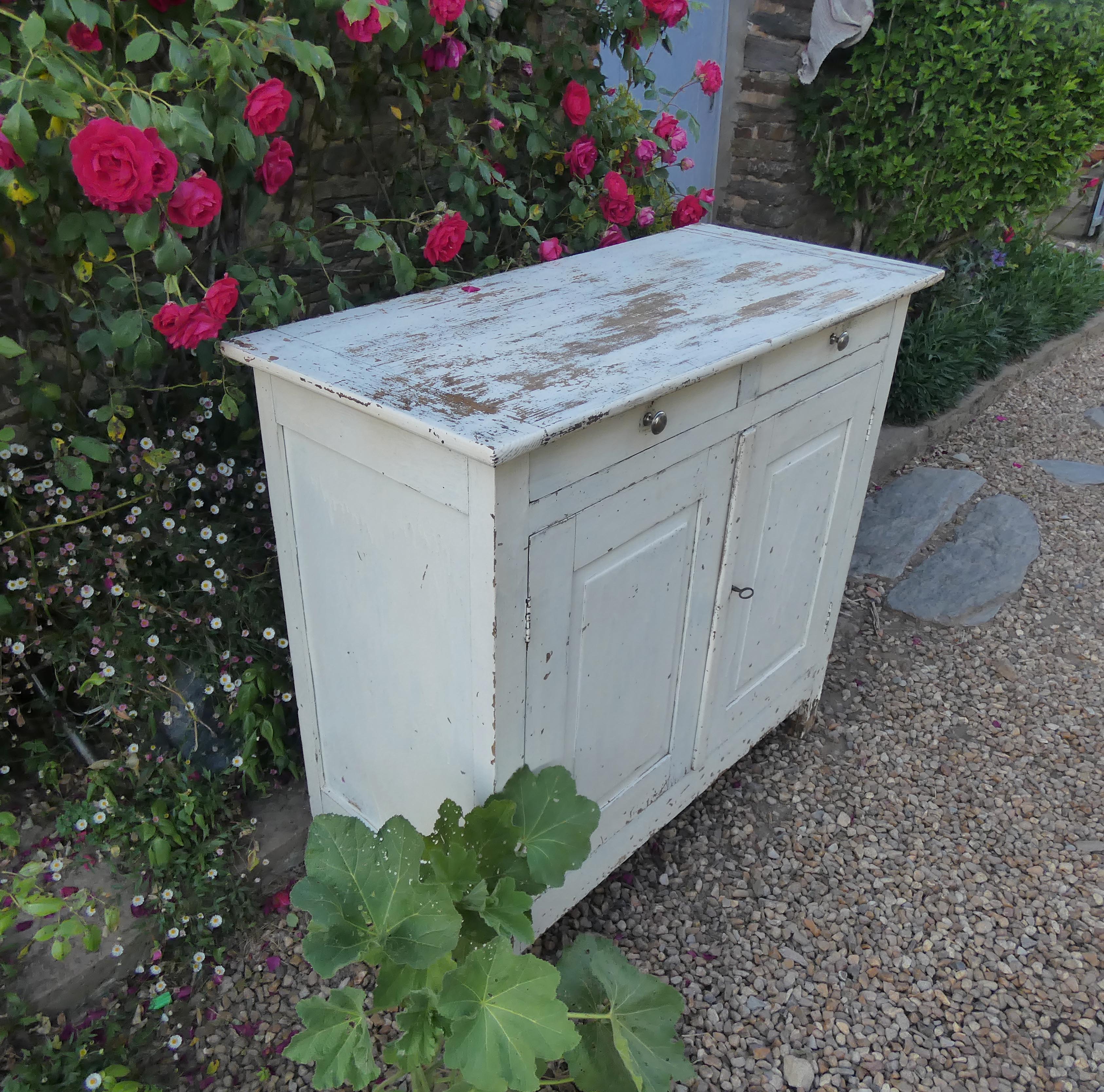 Old patinated wooden sideboard