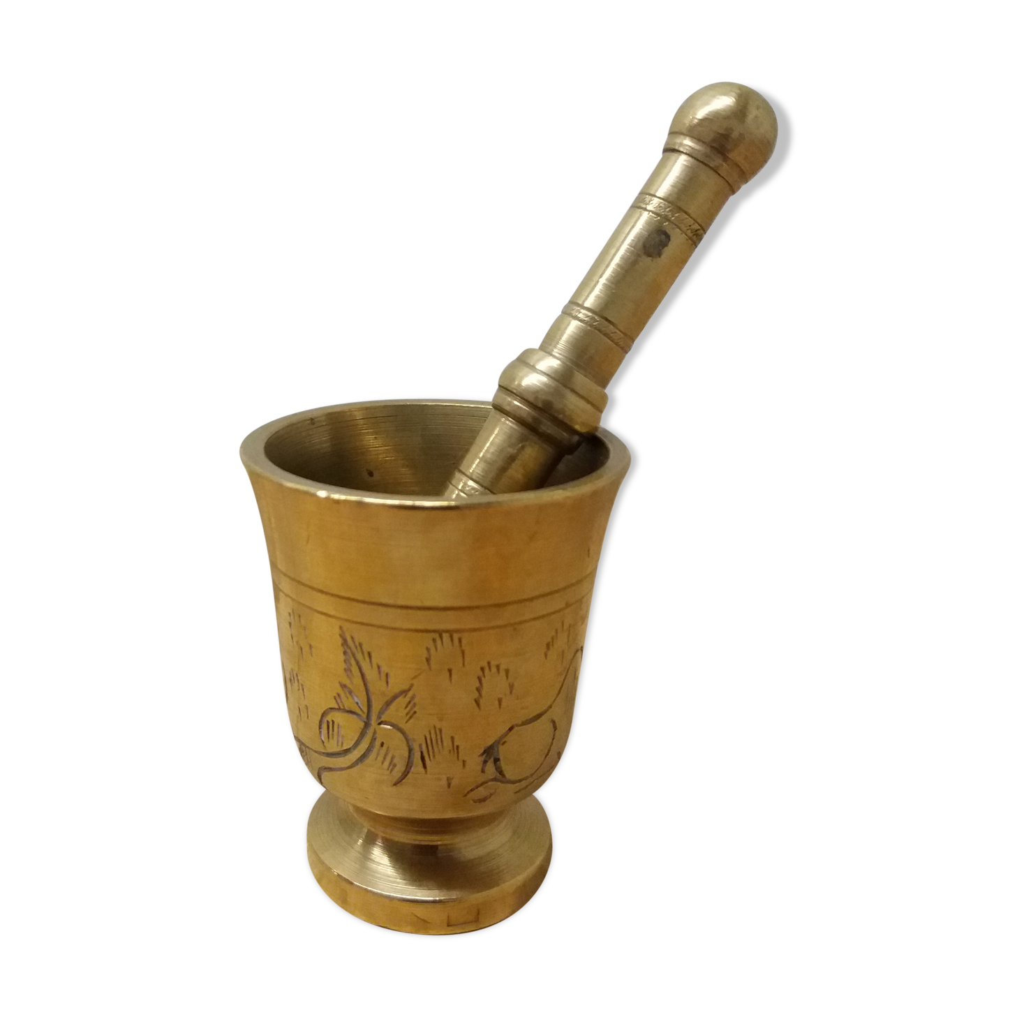 Golden brass mortar and pestle