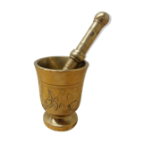 Golden brass mortar and pestle