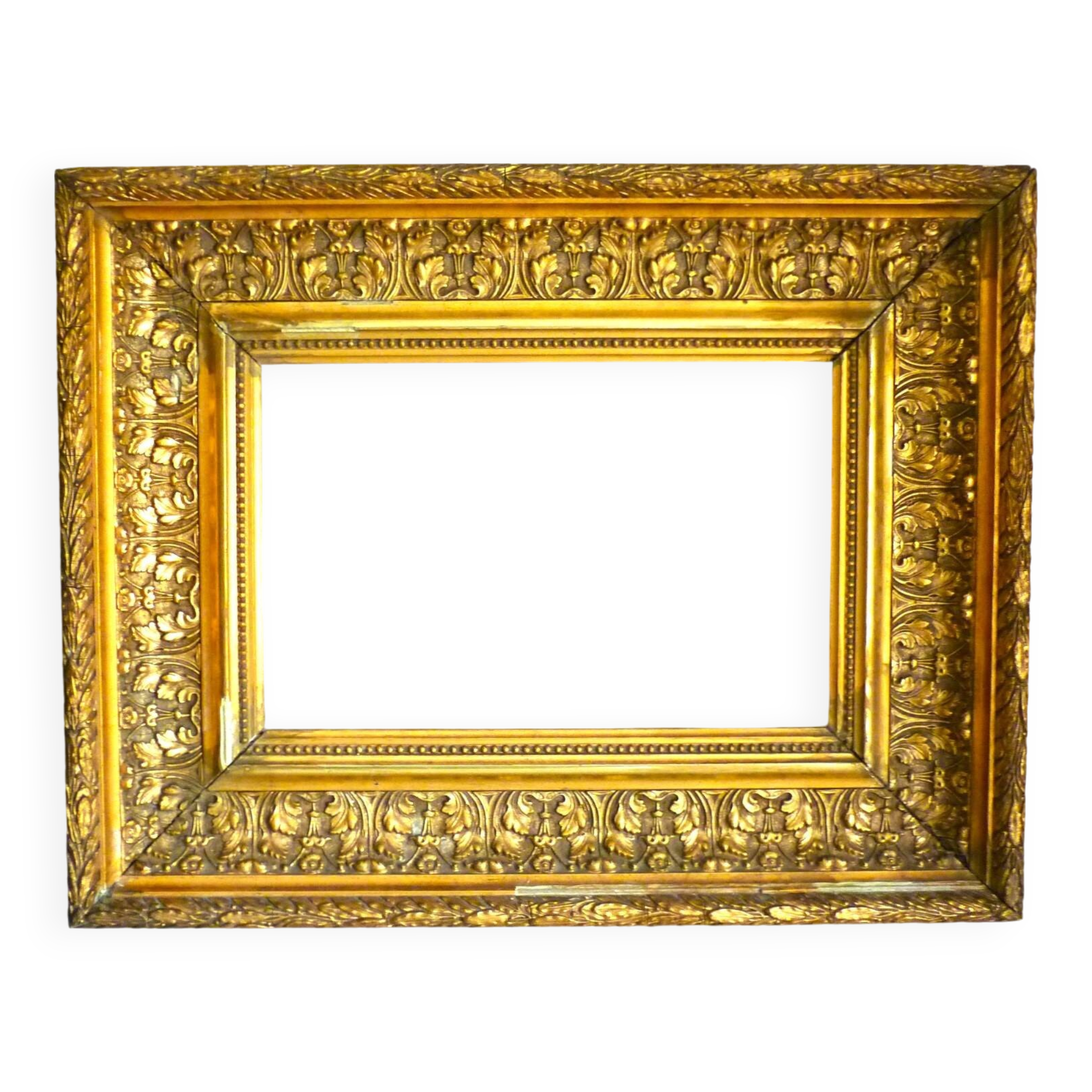 Antique gilded frame in wood and stucco, carved, original gilding