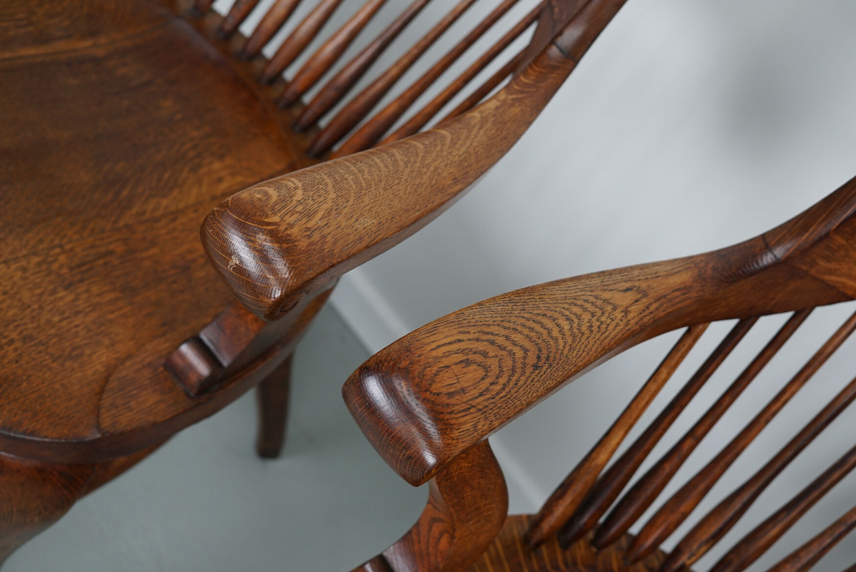 Pair of English Edwardian Oak Spindle Back Captains Office Desk Chairs